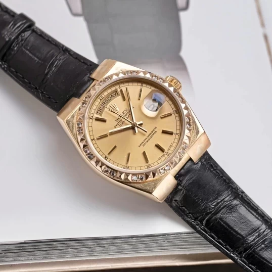Rolex Oysterquartz Day-Date 19018 Yellow Gold Champagne Dial Diamond Bezel