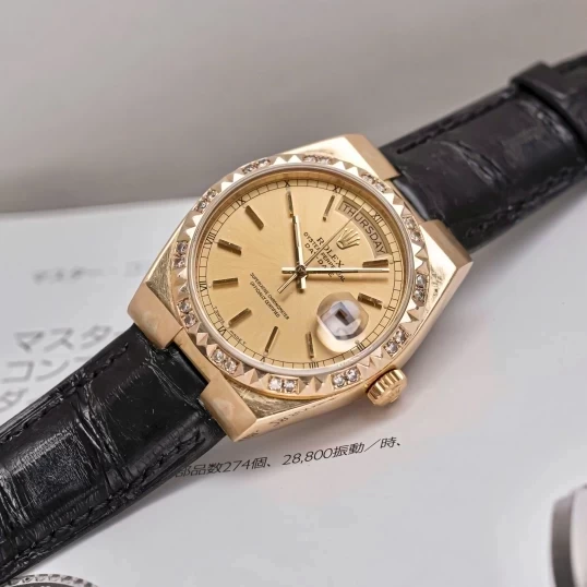 Rolex Oysterquartz Day-Date 19018 Yellow Gold Champagne Dial Diamond Bezel