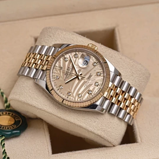 Rolex Oyster Perpetual Datejust 36mm Ref. 126233  Champagne Palm Motif Dial