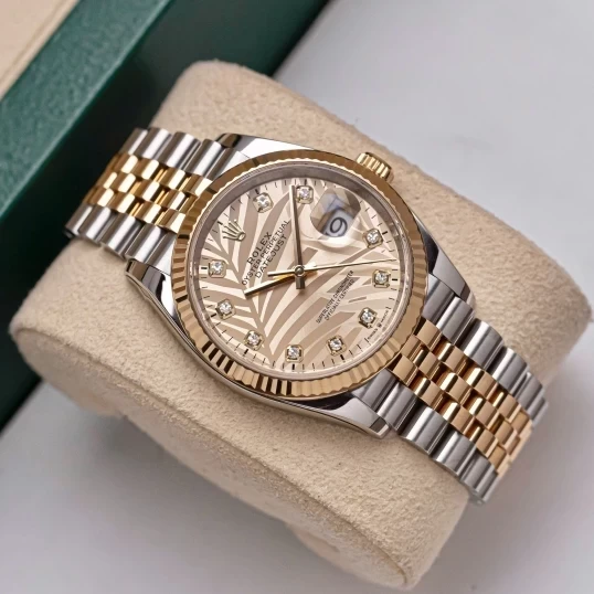 Rolex Oyster Perpetual Datejust 36mm Ref. 126233  Champagne Palm Motif Dial