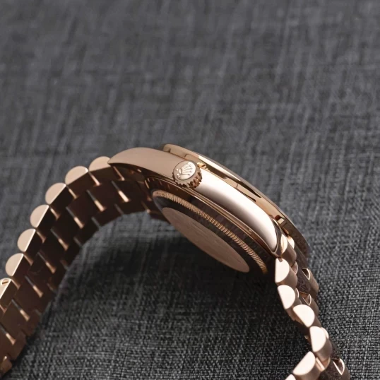 Rolex Oyster Perpetual Day-Date 40mm 228235 Everose Gold Chocolate Dial – Custom Baguette Diamond Bezel