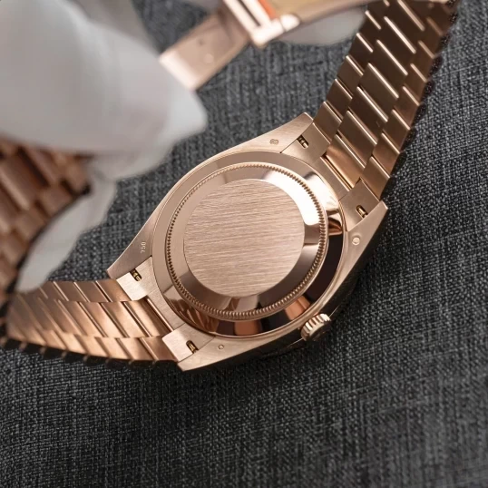 Rolex Oyster Perpetual Day-Date 40mm 228235 Everose Gold Chocolate Dial – Custom Baguette Diamond Bezel