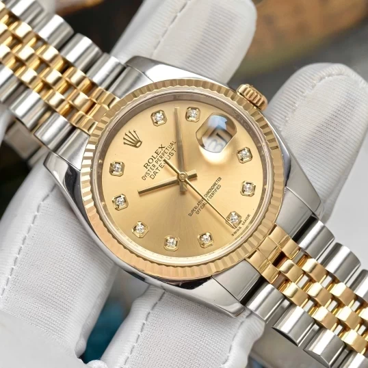 Rolex Oyster Perpetual Datejust 36mm Ref. 116233 Champagne Diamond Dial