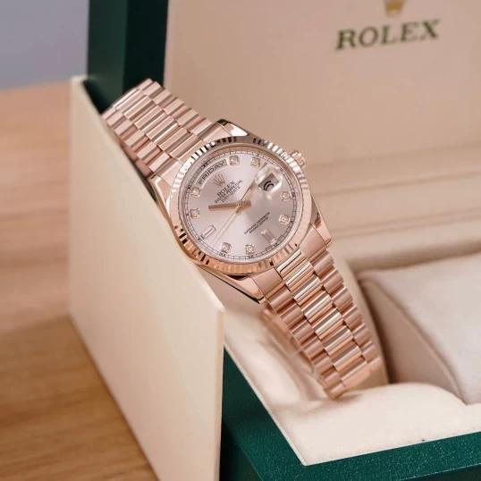 Rolex Day-Date 36 Sundust Dial – Ref. 118235