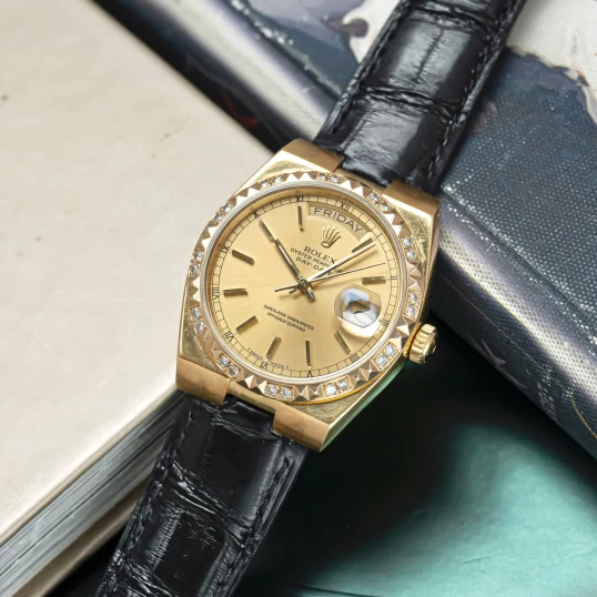 Rolex Oysterquartz Day-Date Ref. 19018 Yellow Gold Champagne Dial Diamond Bezel