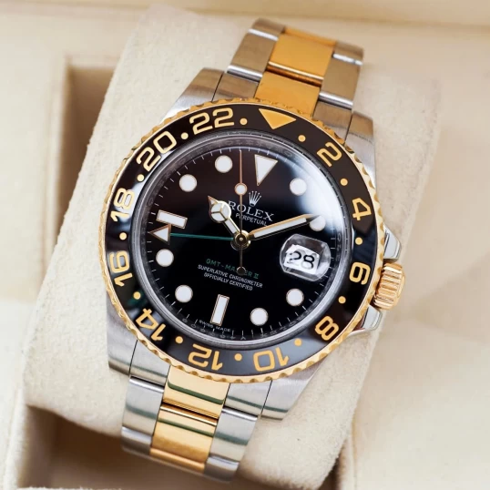 Rolex Oyster Perpetual GMT-Master II 40mm Ref. 116713LN – Black Dial Demi Gold