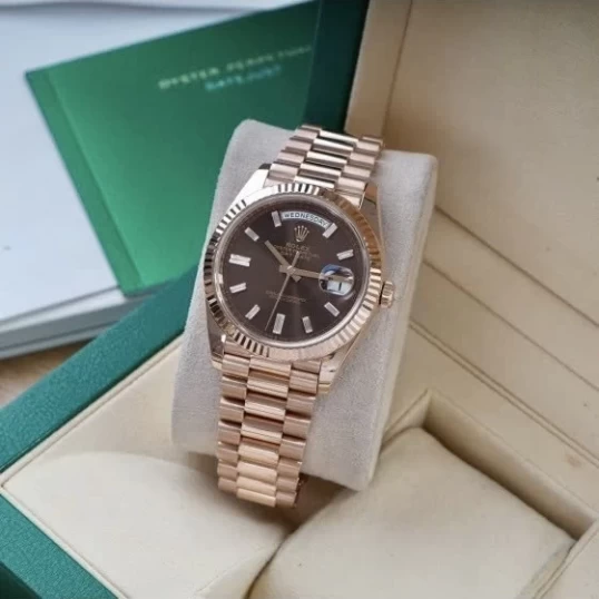 Rolex Oyster Perpetual Day-Date 40mm Ref. 228235 – Chocolate Dial Diamond Baguette