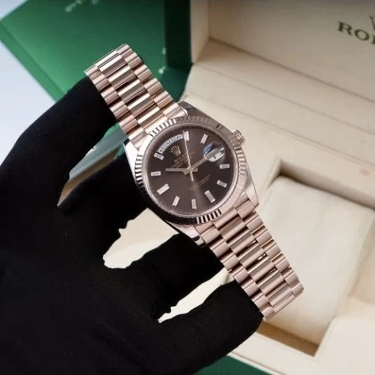 Rolex Oyster Perpetual Day-Date 40mm Ref. 228235 – Chocolate Dial Diamond Baguette