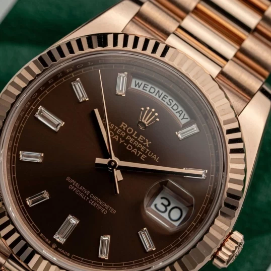 Rolex Oyster Perpetual Day-Date 40mm – Ref. 228235 – Chocolate Baguette Diamond Dial
