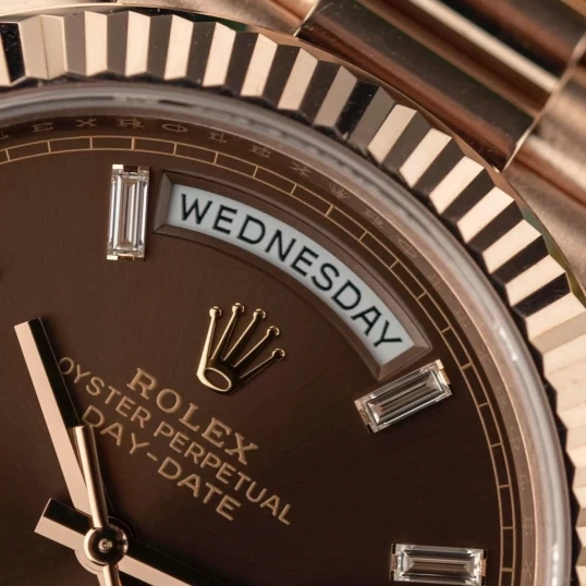 Rolex Oyster Perpetual Day-Date 40mm – Ref. 228235 – Chocolate Baguette Diamond Dial