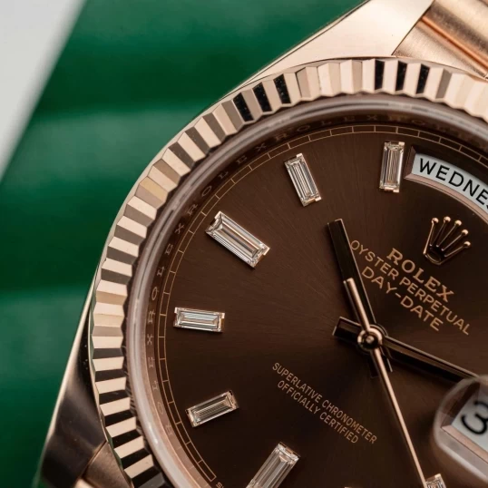 Rolex Oyster Perpetual Day-Date 40mm – Ref. 228235 – Chocolate Baguette Diamond Dial
