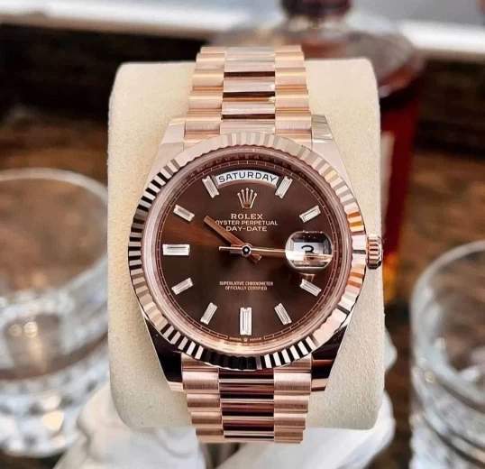 Rolex Oyster Perpetual Day-Date 40 Ref. 228235 – Chocolate Baguette Diamond Dial