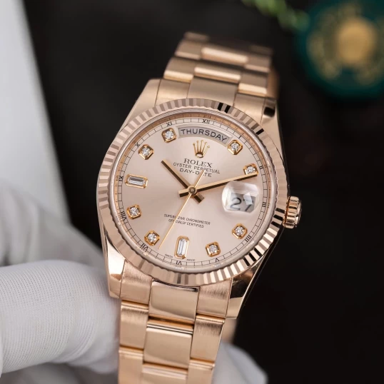 Rolex Oyster Perpetual Day-Date 36 Ref. 118205 – Everose Gold – Sundust Diamond Dial